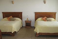 Habitación Estándar Cuádruple Dos Camas Matrimoniales del Hotel Casa del Rio