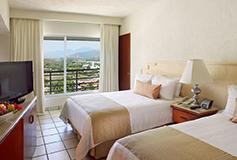 Habitación Superior Vista al Mar AI Dos Camas Dobles del Hotel Emporio Ixtapa