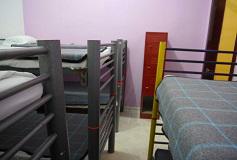 Habitación Dormitorio 8 Camas Mixto del Hotel Hostal Amigo