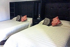 Habitación Junior con Dos Camas Matrimoniales del Hotel Hotel Casa Arcángel