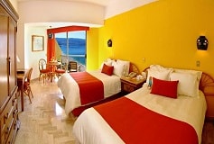 Habitación Habitación Deluxe Dos Camas Matrimoniales del Hotel Hotel Gamma Acapulco Copacabana