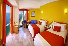 Habitación Junior Suite Dos Camas Matrimoniales del Hotel Hotel Gamma Acapulco Copacabana