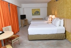 Habitación Junior Suite Dos Camas Matrimoniales del Hotel Hotel HS HOTSSON Smart Acapulco