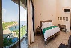 Habitación De Lujo King con Vista Parcial al Mar del Hotel Hotel Coral Blue Huatulco