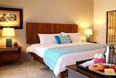 Habitación Habitación De Lujo Cama King Size Vista al Jardín del Hotel Hotel Las Villas Spa And Golf Resort By Estrella del Mar