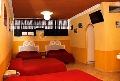 Habitación Suite Normal Cuádruple del Hotel Hotel Suites Elia Noemí