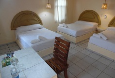 Habitación Estándar Tres Camas Aire Acondicionado del Hotel Hotel Zanzibar