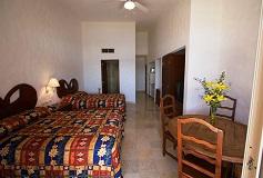 Habitación Estudio con 2 Camas Matrimoniales y Cocineta del Hotel Hotel Quijote Inn