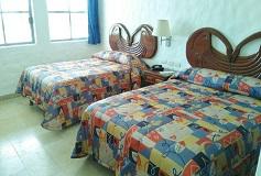 Habitación Estándar con Dos Camas Matrimoniales del Hotel Hotel Quijote Inn
