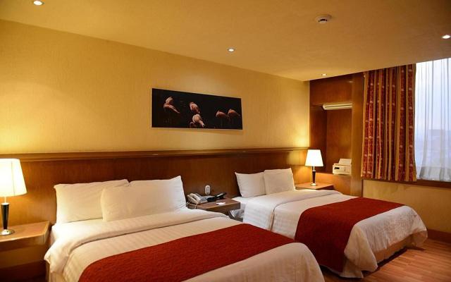Habitación Estándar Dos Camas Queen Fumadores del Hotel Hotel Ramada Vía Veneto Ciudad de México Sur