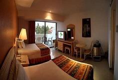 Habitación Deluxe Vista Parcial al Mar con Balcón del Hotel Hotel Tesoro Ixtapa